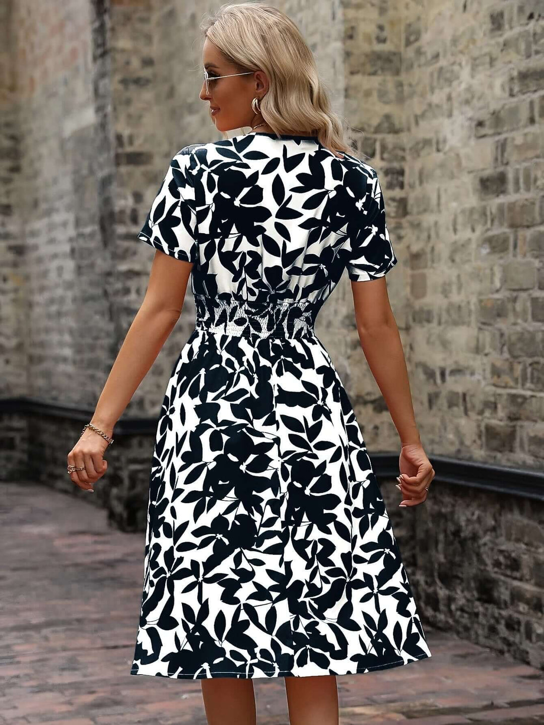 Elegant Floral Midi Dress with Smocked Detail