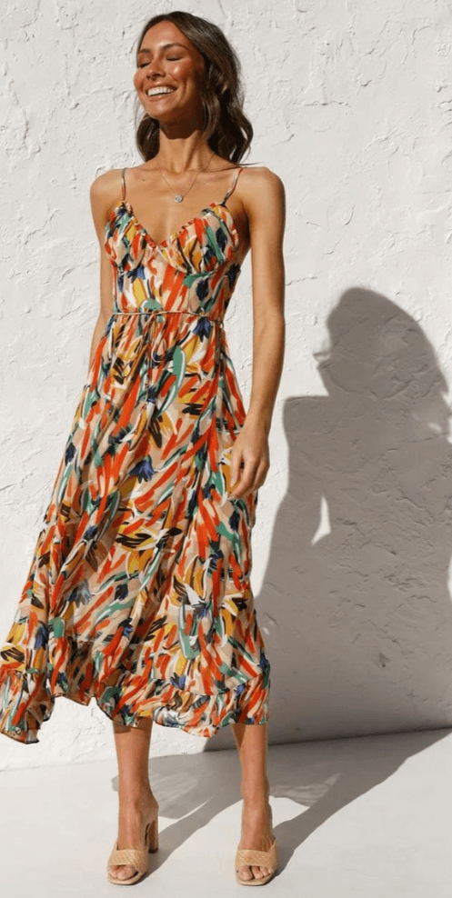 Elegant Sleeveless Midi Dress: V-Neck, Flowy Fit