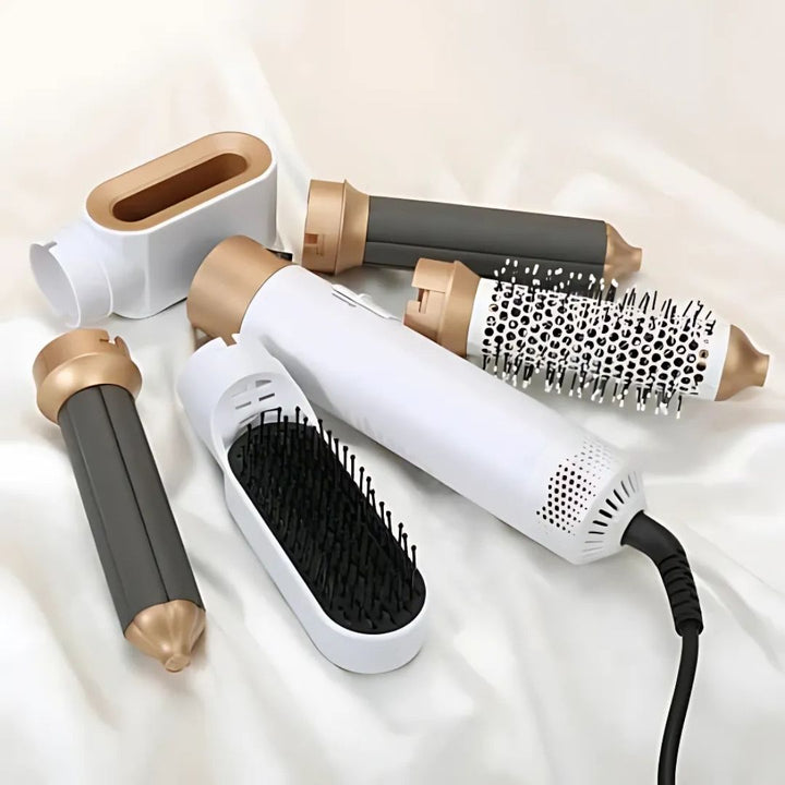 "5-in-1 hair styler with air tech, five attachments, sleek silver design for curling, drying, smoothing, volumizing."