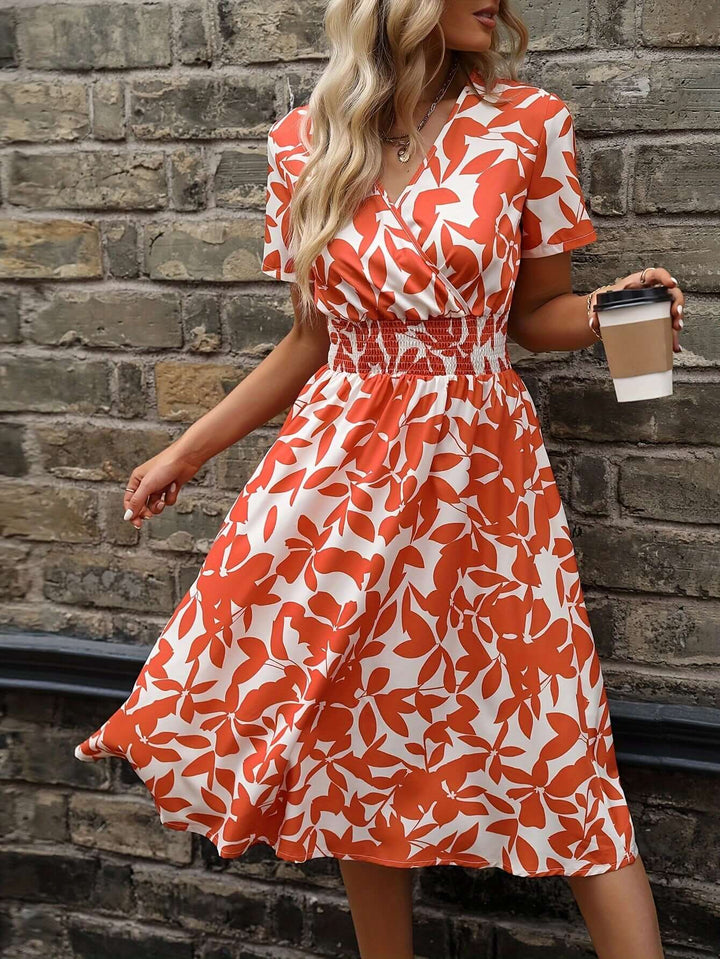 Elegant Floral Midi Dress with Smocked Detail