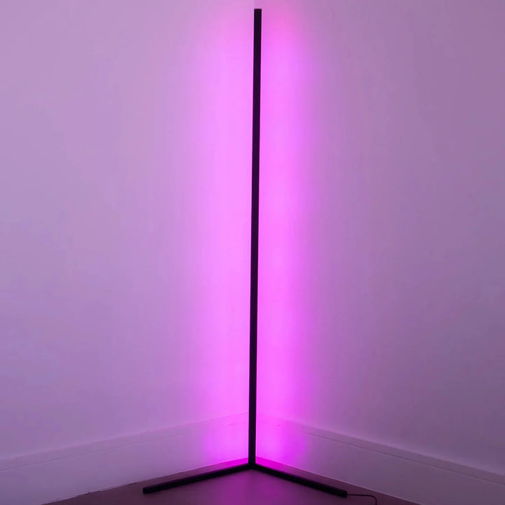 "Adjustable colorful floor lamp with smart features, showcasing dynamic hues and modern sleek design in a living room."
