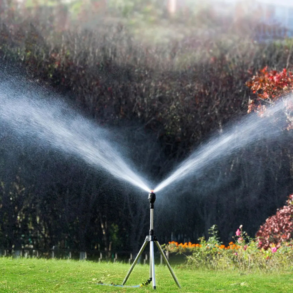 "Automatic rotating garden sprinkler with adjustable tripod, sleek design, wide water coverage, ideal for lawns and flower be