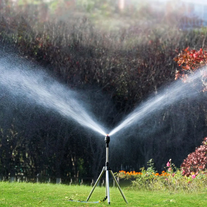 "Automatic rotating garden sprinkler with adjustable tripod, sleek design, wide water coverage, ideal for lawns and flower be