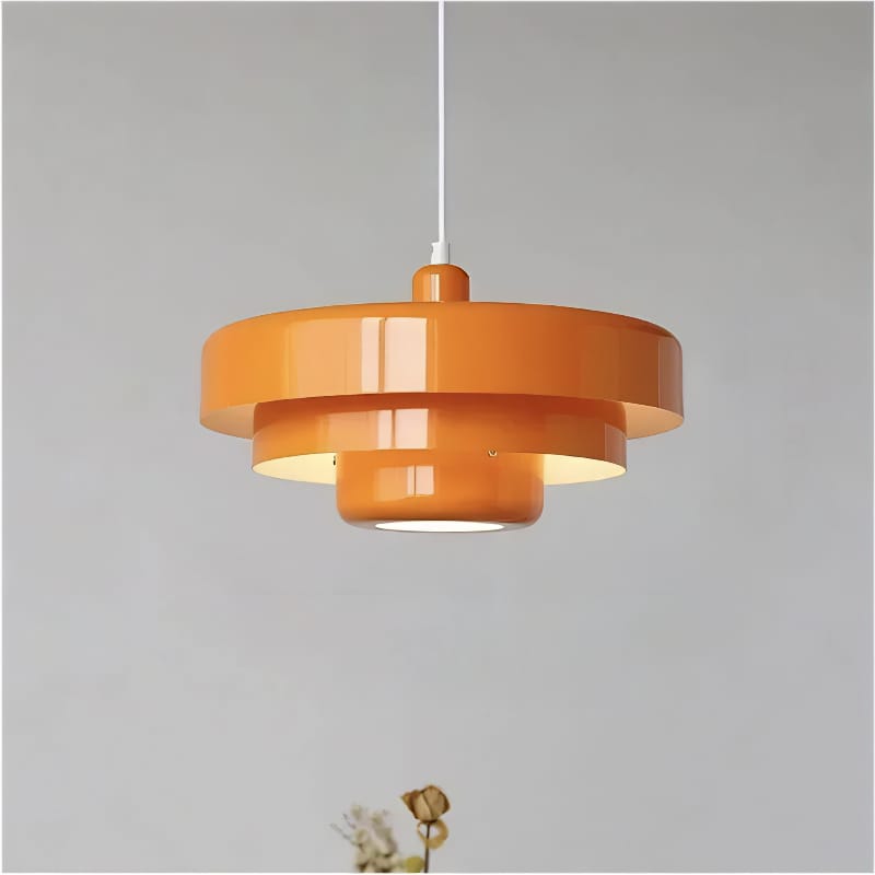 Bauhaus Metal LED Pendant Light in vibrant orange, green, and white with three-tier design illuminating a modern room.