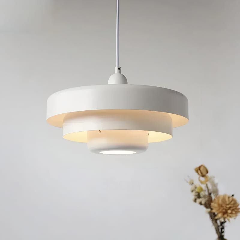 Bauhaus Metal LED Pendant Light in vibrant orange, green, and white with three-tier design illuminating a modern room.