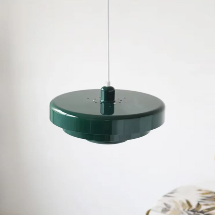 Bauhaus Metal LED Pendant Light in vibrant orange, green, and white with three-tier design illuminating a modern room.