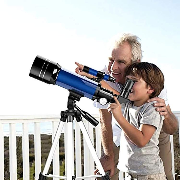 "Beginner-friendly telescope with tripod for stargazing, features 70mm aperture, 400mm focal length, portable and stable."