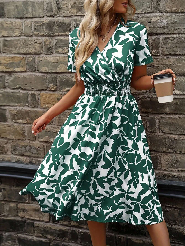 Elegant Floral Midi Dress with Smocked Detail