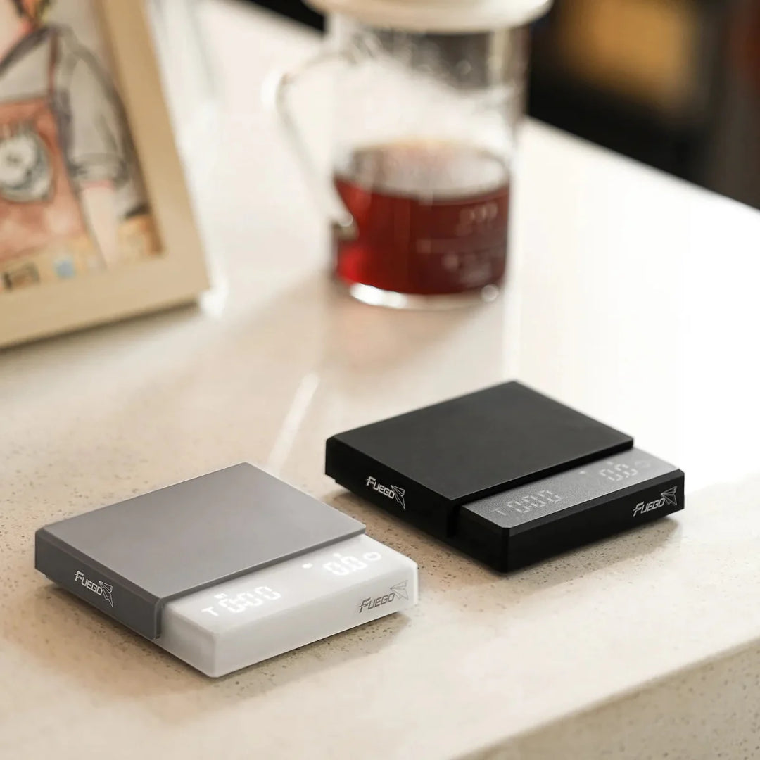 "Compact pocket digital coffee scale with timer, LCD, and high precision for kitchen and dining use, ideal for baristas."