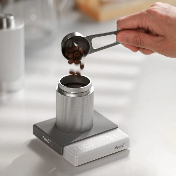 "Compact pocket digital coffee scale with timer, LCD, and high precision for kitchen and dining use, ideal for baristas."