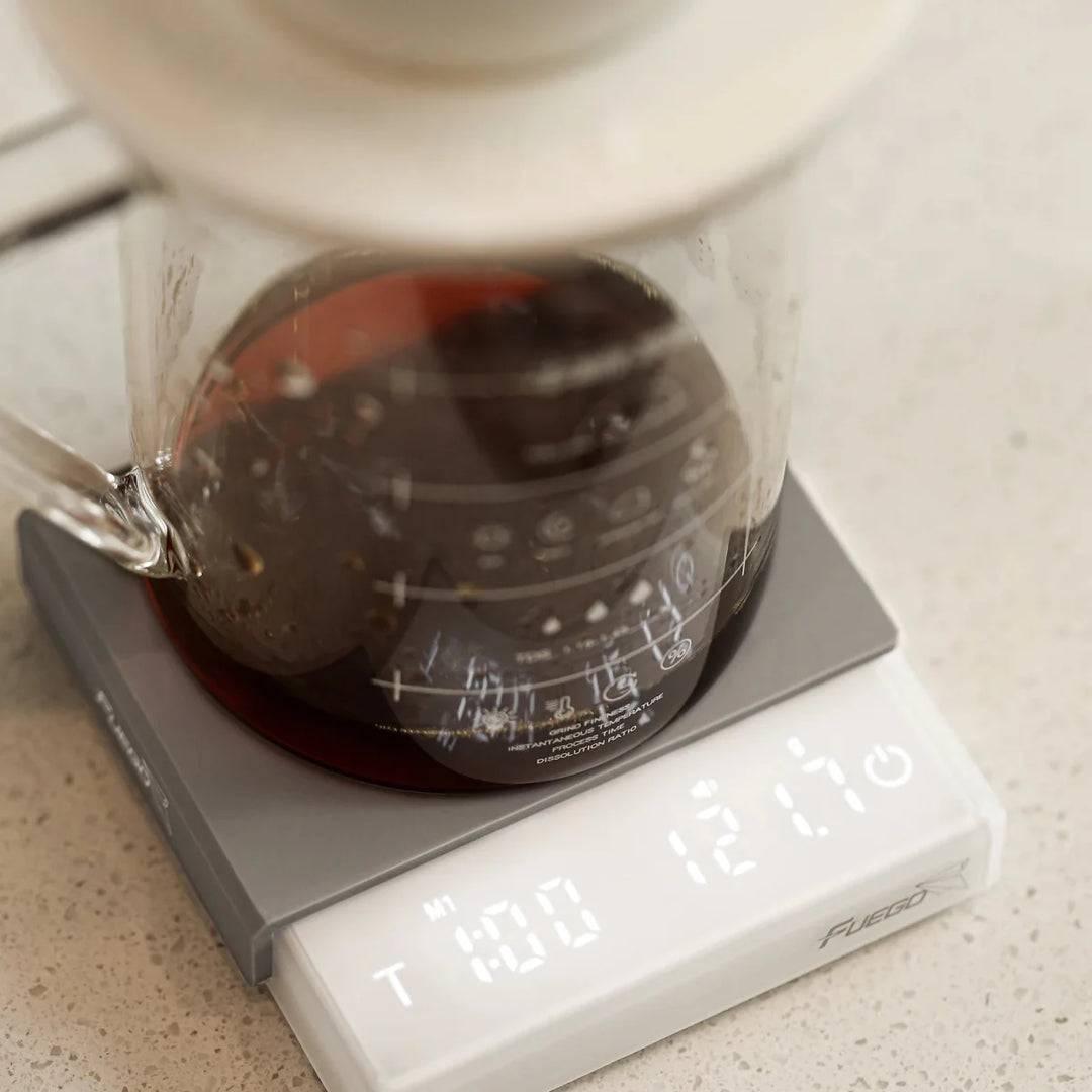 "Compact pocket digital coffee scale with timer, LCD, and high precision for kitchen and dining use, ideal for baristas."