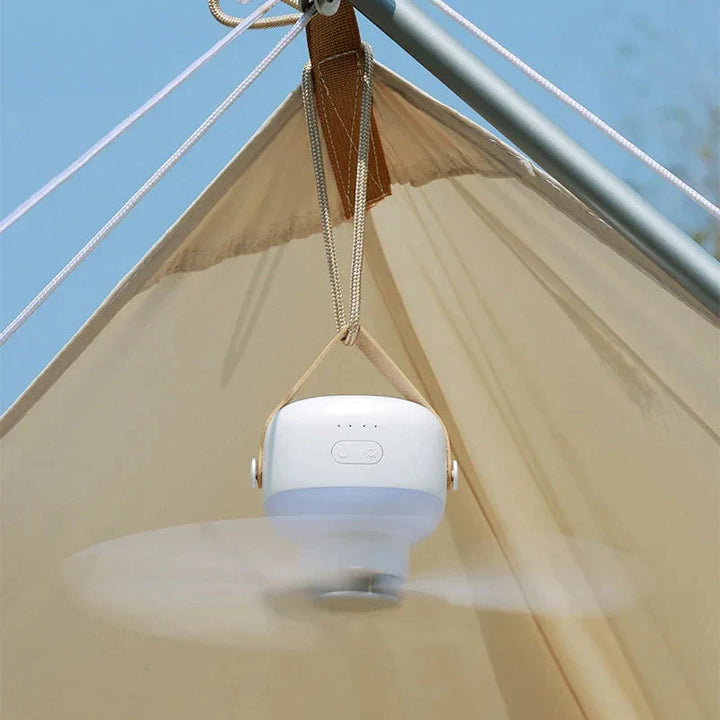"Compact portable ceiling fan with LED light, remote, and tripod stand; blends sleek design, innovation, and convenience."