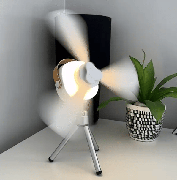 "Compact portable ceiling fan with LED light, remote, and tripod stand; blends sleek design, innovation, and convenience."