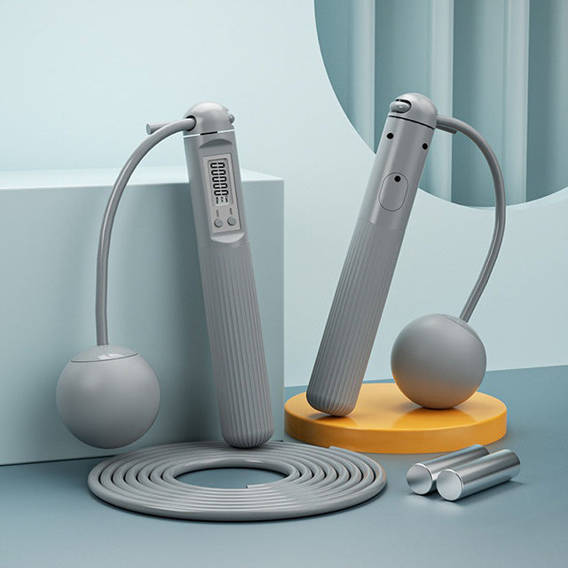 Cordless weighted skipping rope with digital counter, featuring ergonomic grips and sleek design for versatile cardio workout