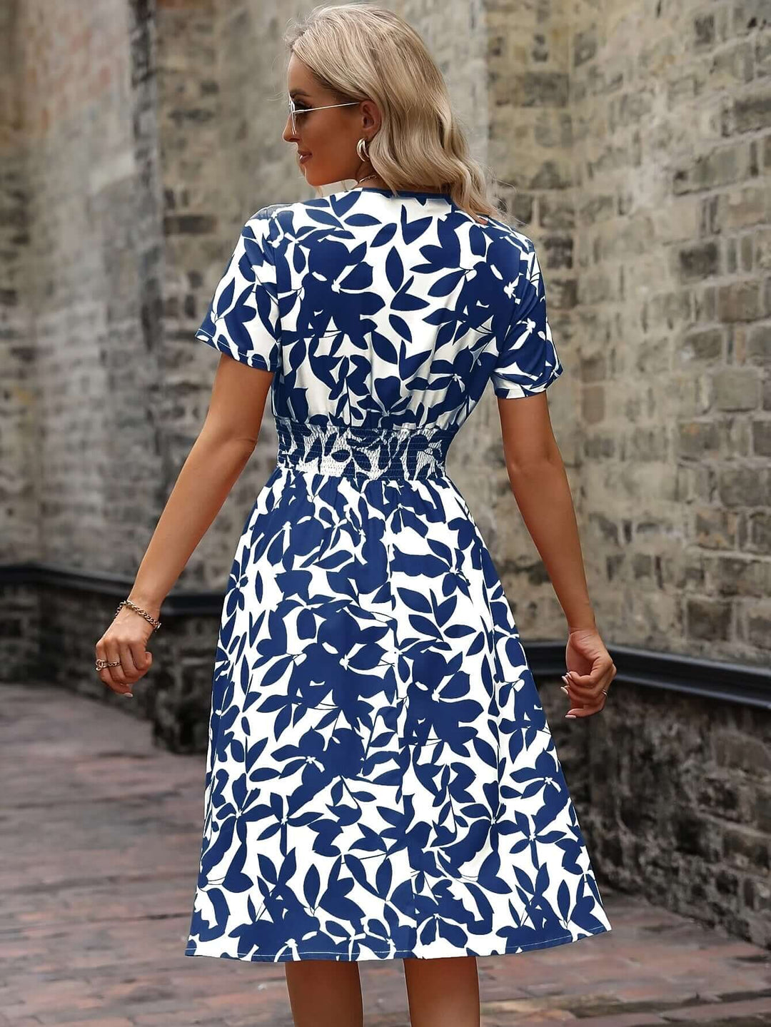 Elegant Floral Midi Dress with Smocked Detail