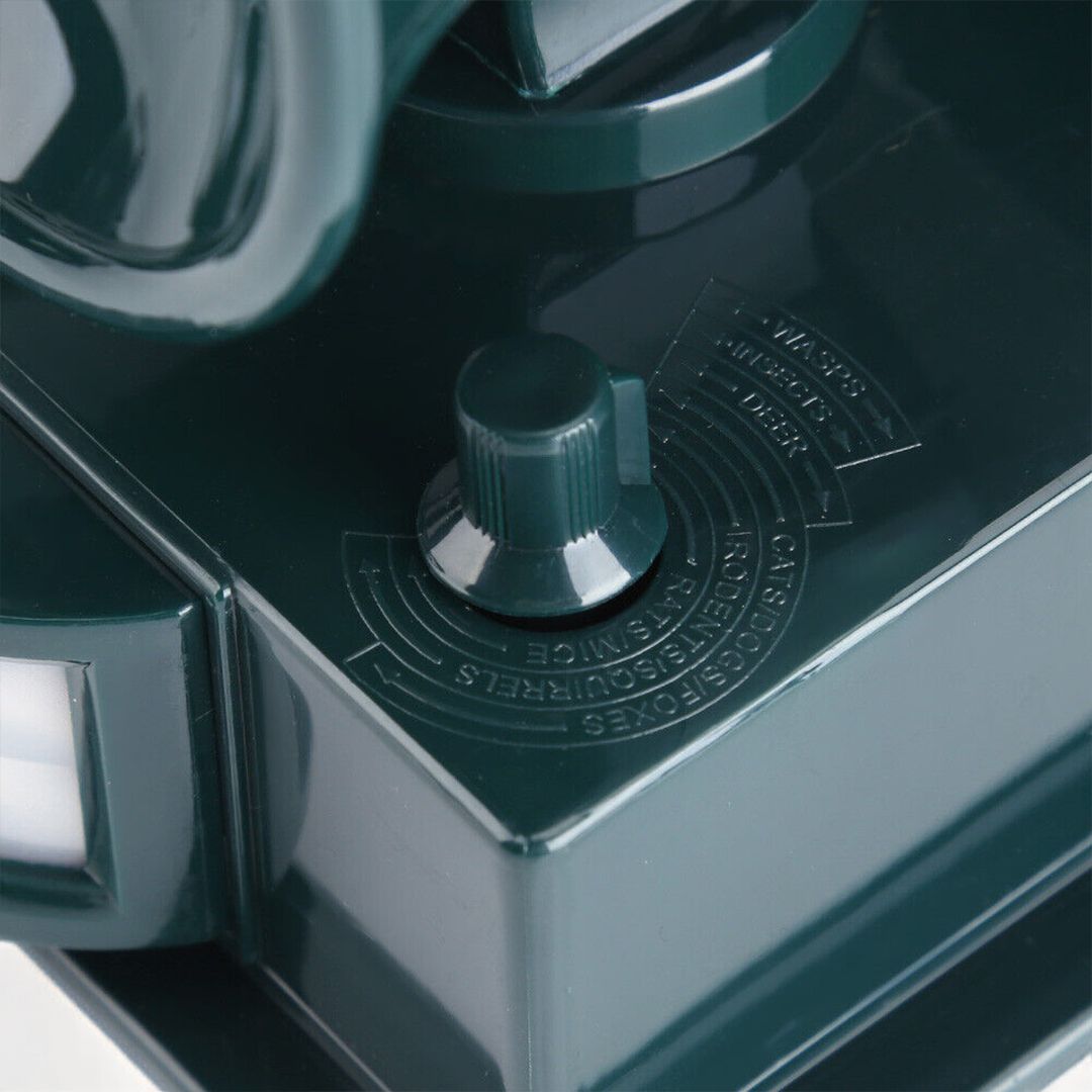 "Eco-friendly solar-powered bird repeller with motion sensor, durable weather-resistant design, for garden and outdoor use."