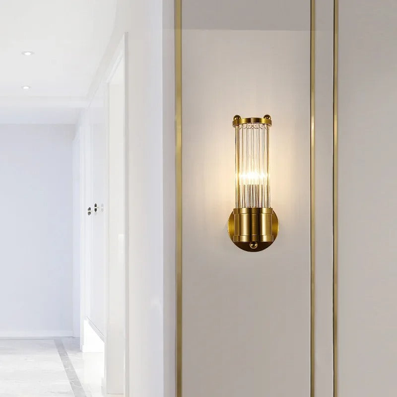 Elegant cylindrical glass wall sconce with chrome finish, crystal accents, electroplated hardware. Ideal for modern interiors