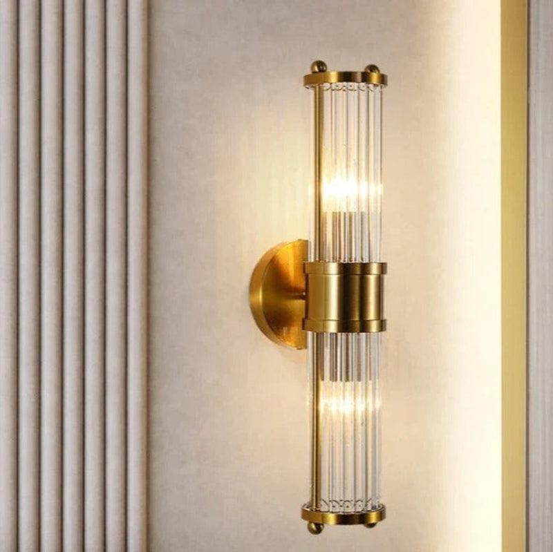Elegant cylindrical glass wall sconce with chrome finish, crystal accents, electroplated hardware. Ideal for modern interiors