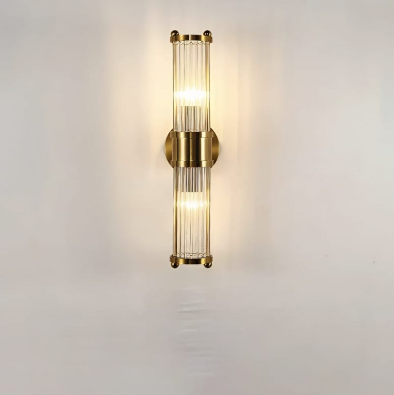 Elegant cylindrical glass wall sconce with chrome finish, crystal accents, electroplated hardware. Ideal for modern interiors