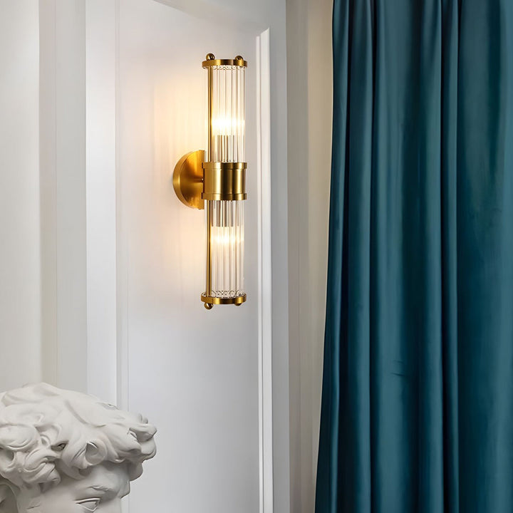 Elegant cylindrical glass wall sconce with chrome finish, crystal accents, electroplated hardware. Ideal for modern interiors