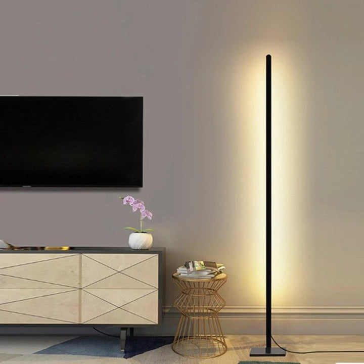Elegant LED floor lamp with minimalist design, soft ambient lighting, adjustable timer, and remote control for modern interio