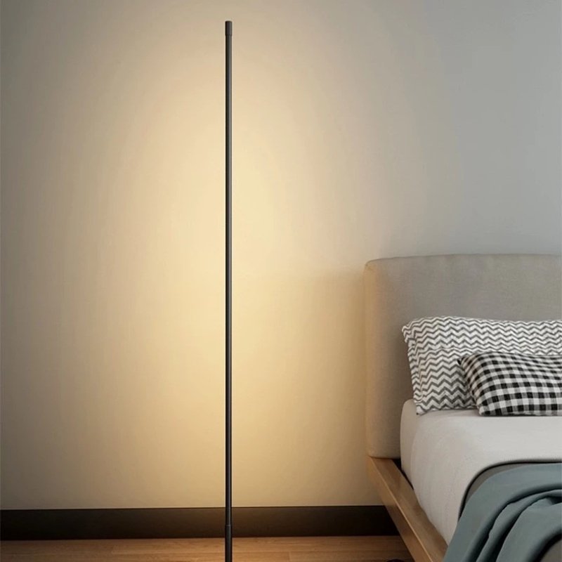 Elegant LED floor lamp with minimalist design, soft ambient lighting, adjustable timer, and remote control for modern interio