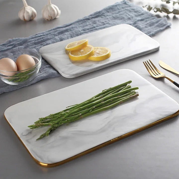 Elegant marble cutting board with smooth, luxurious surface for gourmet cooking, perfect for slicing and artistic serving.