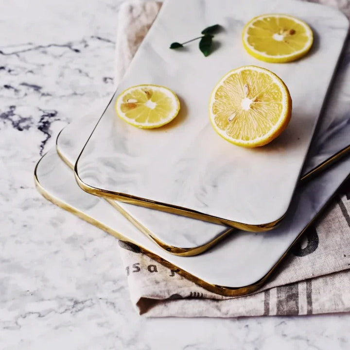 Elegant marble cutting board with smooth, luxurious surface for gourmet cooking, perfect for slicing and artistic serving.
