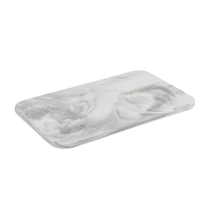 Elegant marble cutting board with smooth, luxurious surface for gourmet cooking, perfect for slicing and artistic serving.