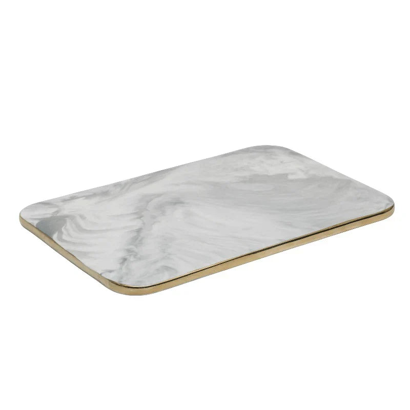 Elegant marble cutting board with smooth, luxurious surface for gourmet cooking, perfect for slicing and artistic serving.