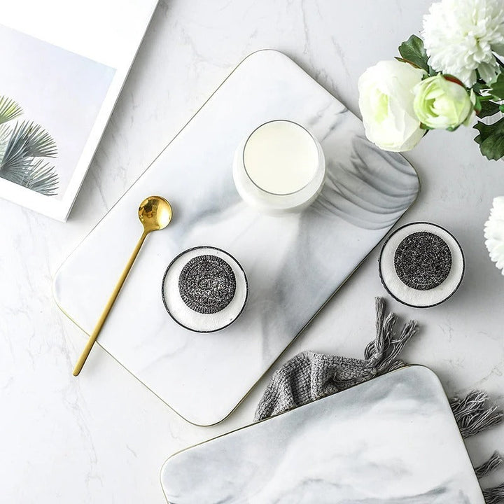 Elegant marble cutting board with smooth, luxurious surface for gourmet cooking, perfect for slicing and artistic serving.