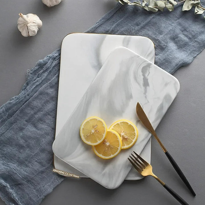 Elegant marble cutting board with smooth, luxurious surface for gourmet cooking, perfect for slicing and artistic serving.