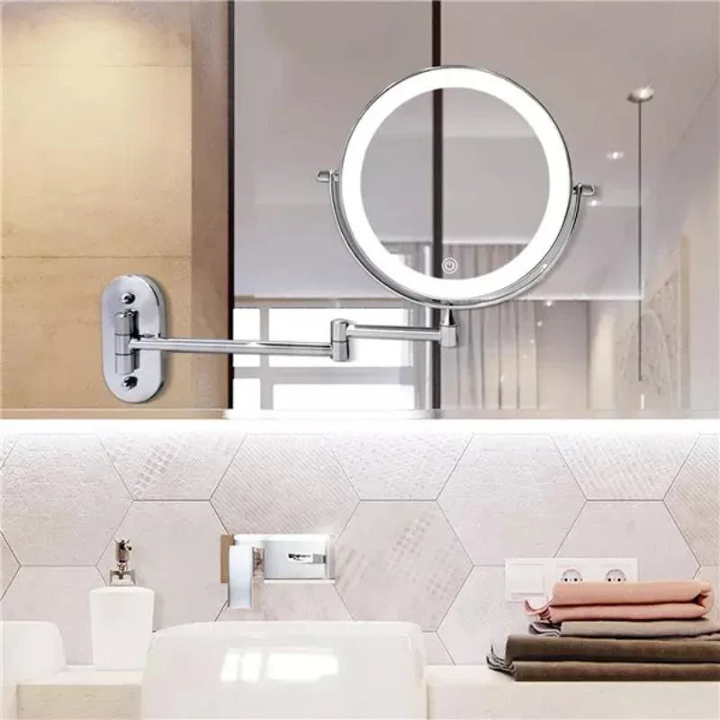 "Elegant rechargeable silver LED mirror, 5 magnification levels, 3 light settings, 360° rotation for perfect beauty regimen."