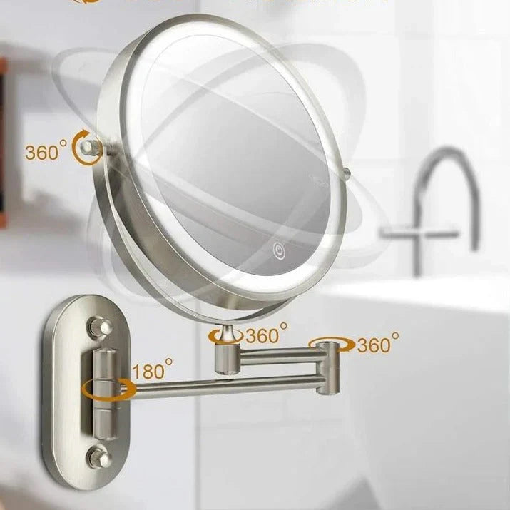 "Elegant rechargeable silver LED mirror, 5 magnification levels, 3 light settings, 360° rotation for perfect beauty regimen."