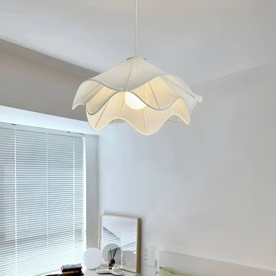Elegant white fabric flower pendant light with soft LED glow, resembling delicate petals, perfect for modern interiors.