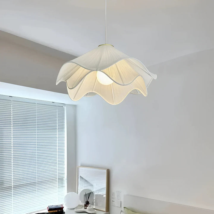 Elegant white fabric flower pendant light with soft LED glow, resembling delicate petals, perfect for modern interiors.