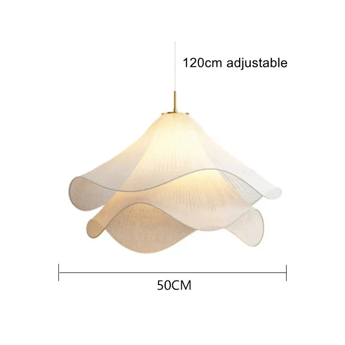 Elegant white fabric flower pendant light with soft LED glow, resembling delicate petals, perfect for modern interiors.