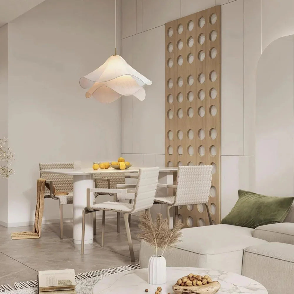 Elegant white fabric flower pendant light with soft LED glow, resembling delicate petals, perfect for modern interiors.