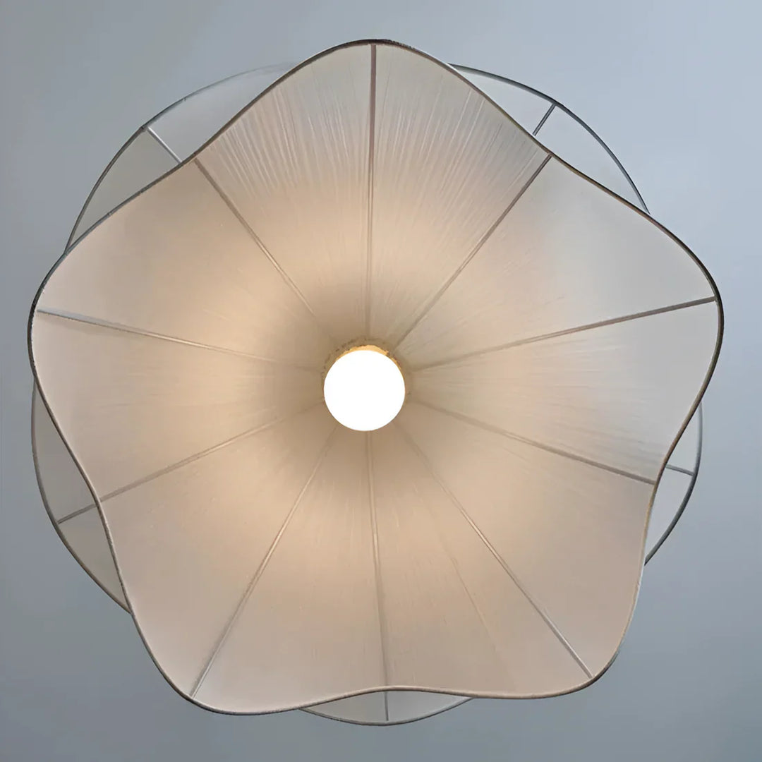 Elegant white fabric flower pendant light with soft LED glow, resembling delicate petals, perfect for modern interiors.