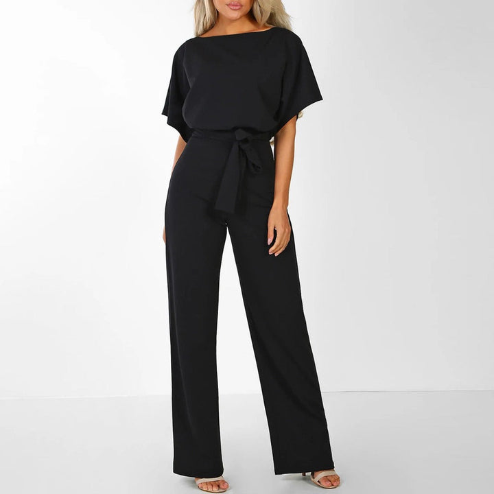 "Elegant women's beige jumpsuit with belt, tailored fit, versatile for any occasion. Available in multiple colors."