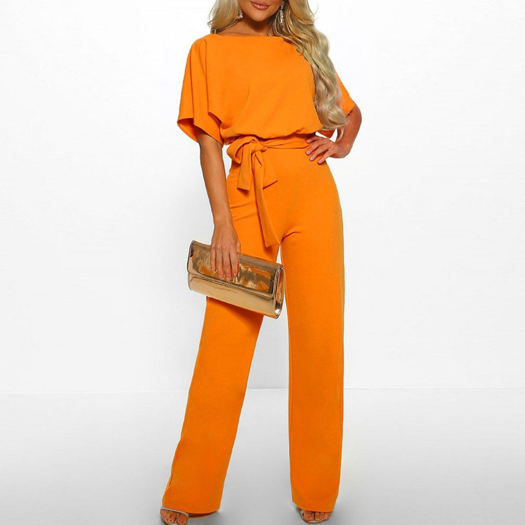 "Elegant women's beige jumpsuit with belt, tailored fit, versatile for any occasion. Available in multiple colors."