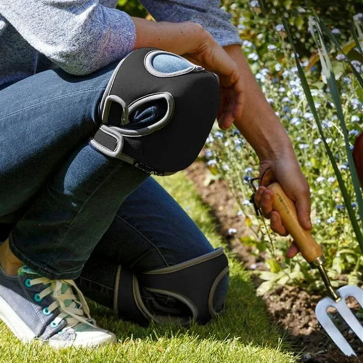 Ergonomic gardening knee pads with extra cushioning, contoured for comfort, shown in a durable, rugged design for outdoor use