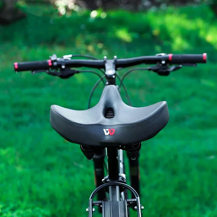 Extra wide cushioned bicycle seat with ergonomic design, shock-absorbing springs, breathable material, and universal fit.