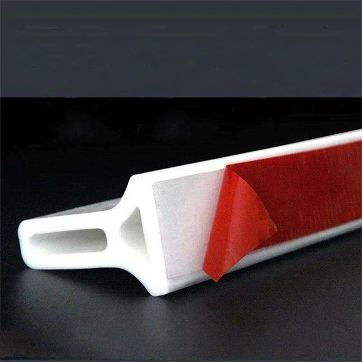 Flexible silicone shower barrier for leakproof seal, keeping bathroom dry. Bendable, self-adhesive strip for easy installatio