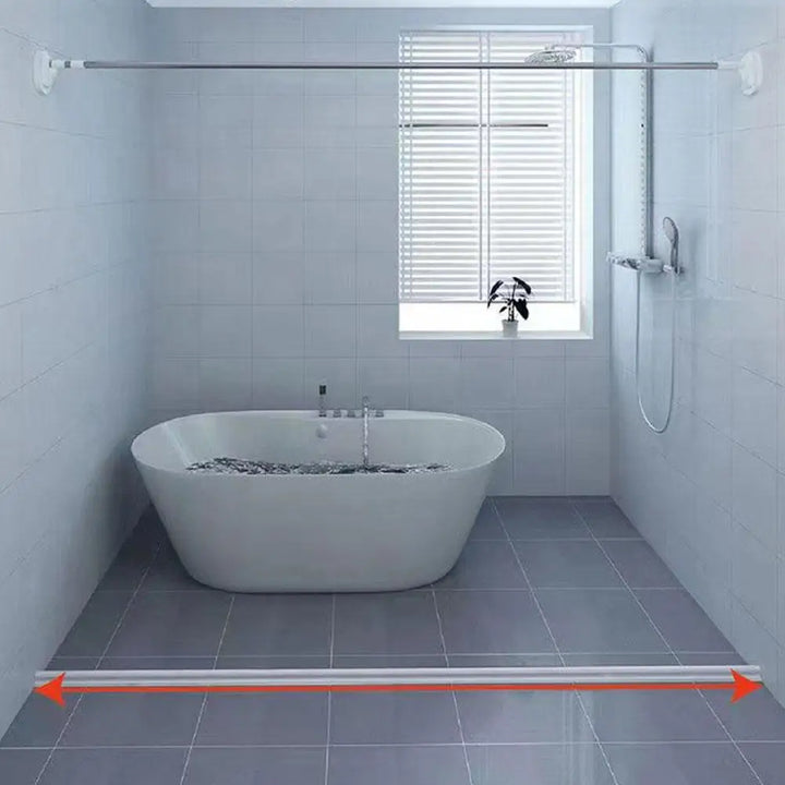 Flexible silicone shower barrier for leakproof seal, keeping bathroom dry. Bendable, self-adhesive strip for easy installatio