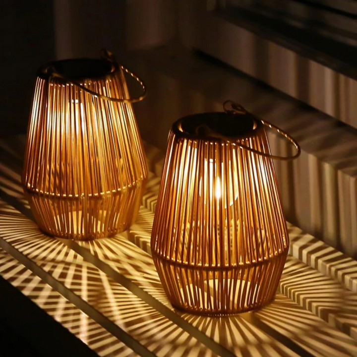Handwoven solar lantern for gardens, featuring a brown rattan design, LED light, and eco-friendly solar-powered technology.