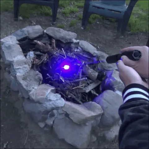 "High-power blue tactical laser torch for outdoor use, features durable aluminum body and adjustable focus."