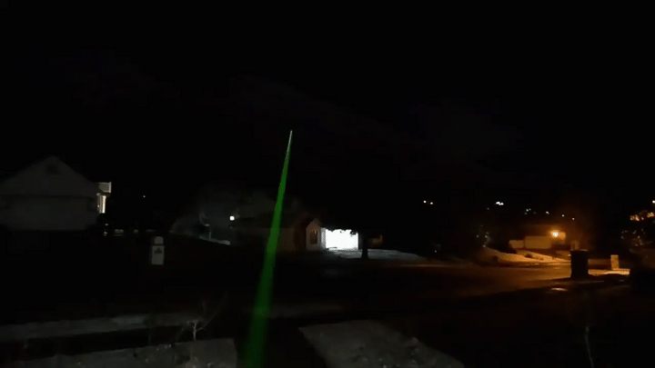 "High power green laser pointer with silver star cap; ideal for presentations and stargazing. USB rechargeable and unisex."