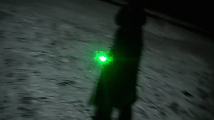 "High power green laser pointer with silver star cap; ideal for presentations and stargazing. USB rechargeable and unisex."