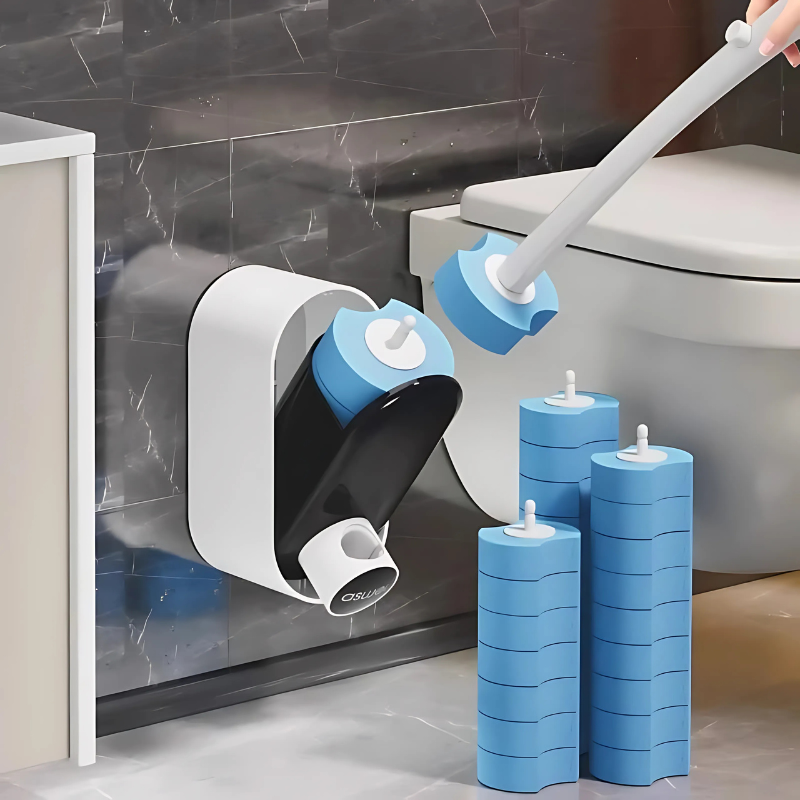 Hygienic disposable toilet brush with ergonomic handle and pre-loaded detergent sponge for eco-friendly cleaning.